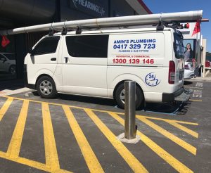amin's plumbing - in an accessible car park and no permit- so much for wheelchair accessibility