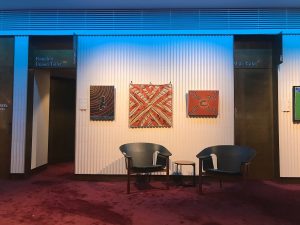 the wall between the women/accessible and mens toilets