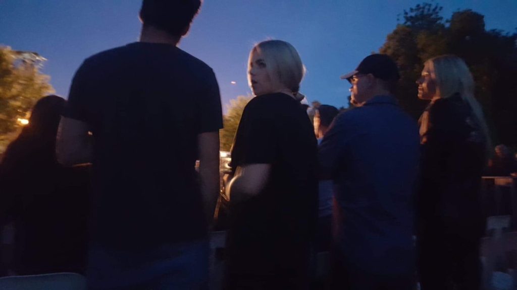 the photo shows the backs of four people who were standing in front of me.