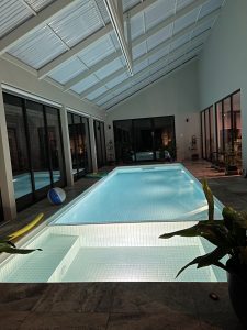 spa and pool in the background, the lifter channel overhead