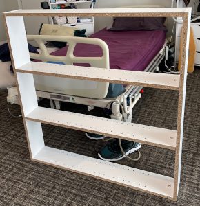 first half of the book shelf is complete