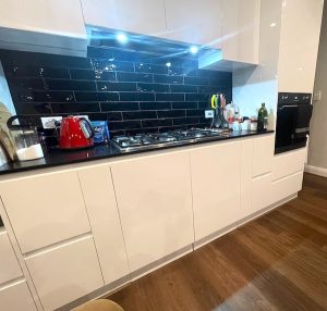 The white doors under the gas stovetop are hiding a secret. Tasty Eggplant Soup